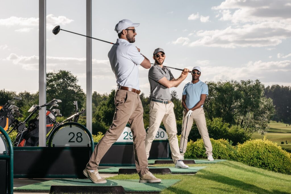 group of golf players playing golf together at golf course